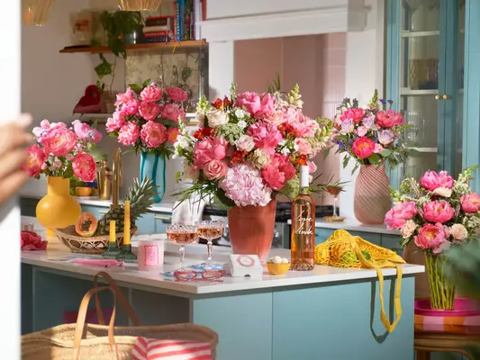 pink peony bouquets on table