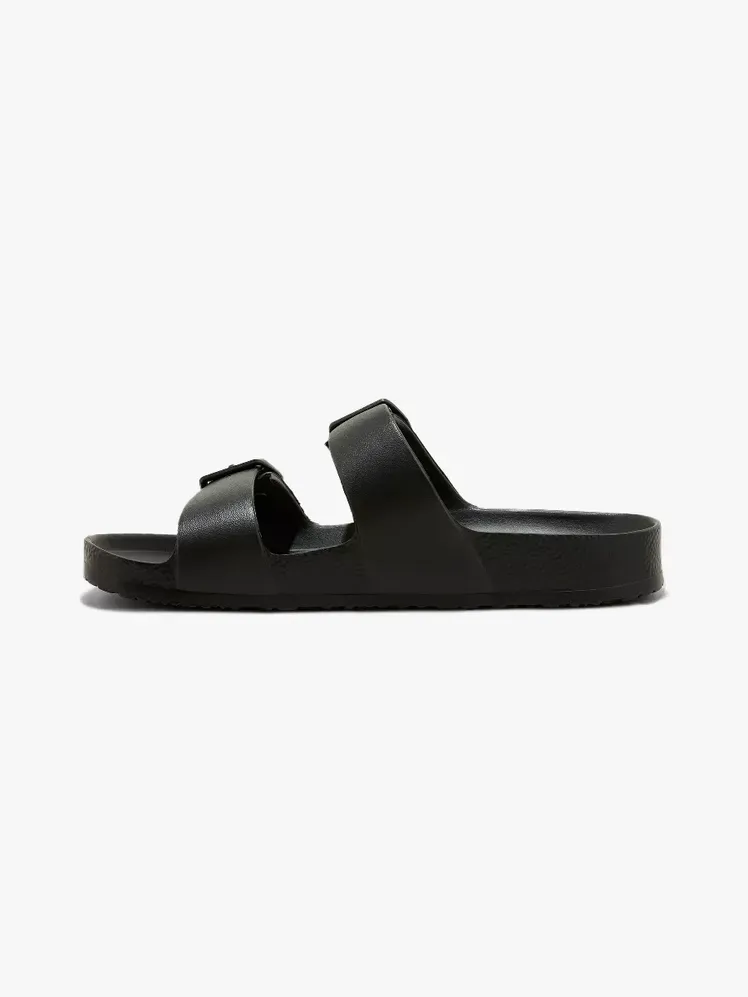 Sandàlies Shade & Shore Neida EVA de dues bandes amb peus amb component de marca sobre fons gris clar