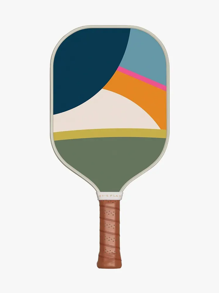 Vista Pickleball Paddle en color marrón, blanco y multicolor sobre fondo gris claro