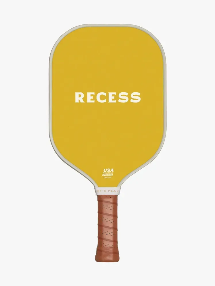 Vista Pickleball Paddle en color marrón, blanco y multicolor sobre fondo gris claro