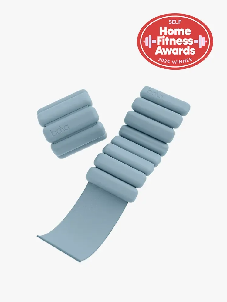 Bala Bangles i märkeskomponent med hem fitness-utmärkelser sigill i det övre högra hörnet på en ljusgrå bakgrund