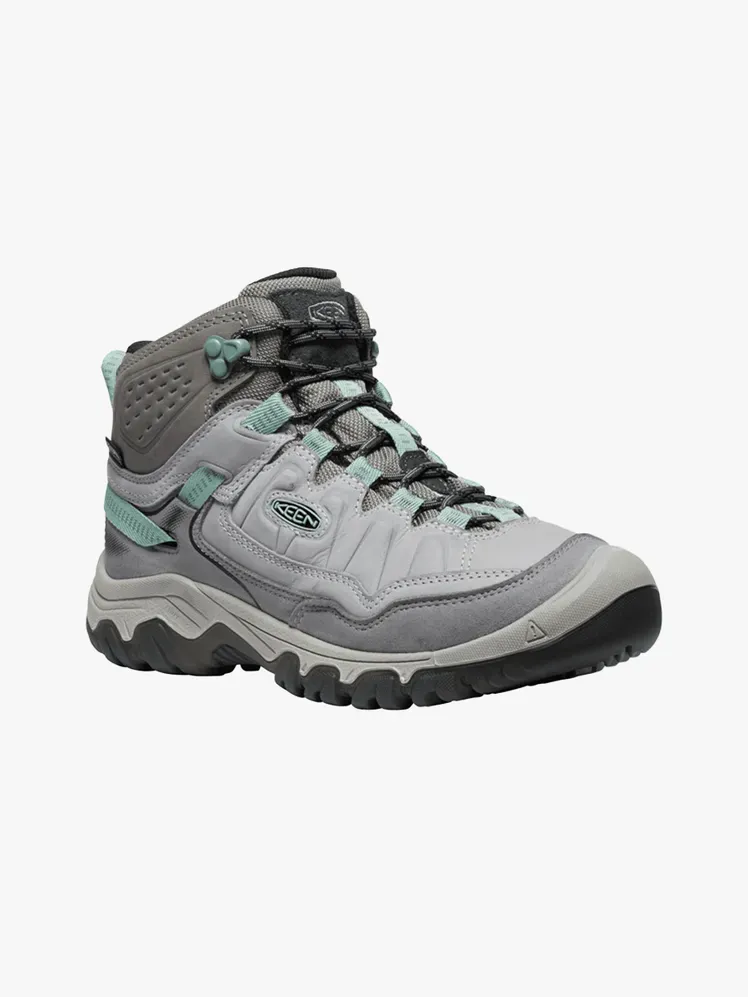Keen Targhee IV Waterproof Mid i märkeskomponent på en ljusgrå bakgrund