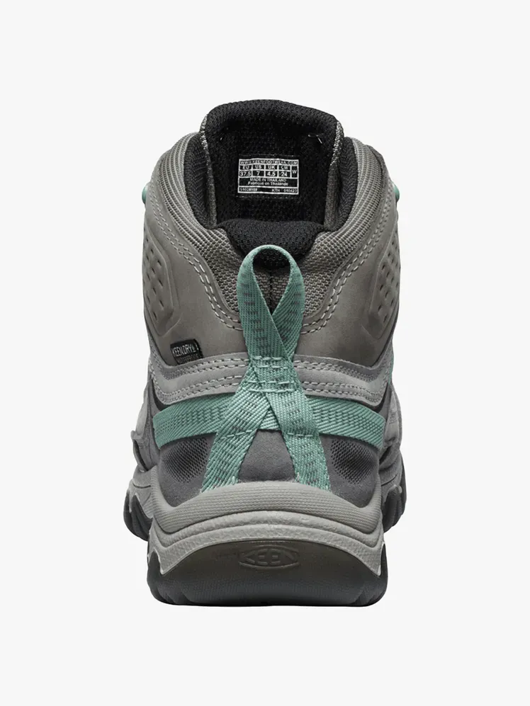 Keen Targhee IV Waterproof Mid i märkeskomponent på en ljusgrå bakgrund