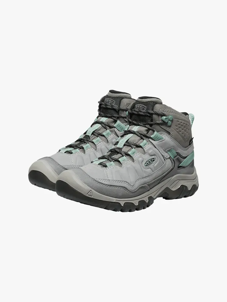 Keen Targhee IV Waterproof Mid i märkeskomponent på en ljusgrå bakgrund