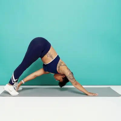 plank to downward dog tap