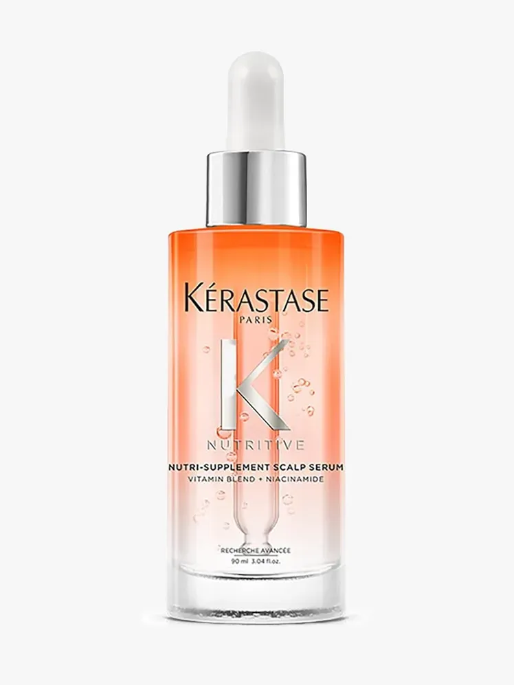Kerastase Paris Nutritive Nutri-Supplement galvos odos serumas su firminiu komponentu šviesiai pilkame fone