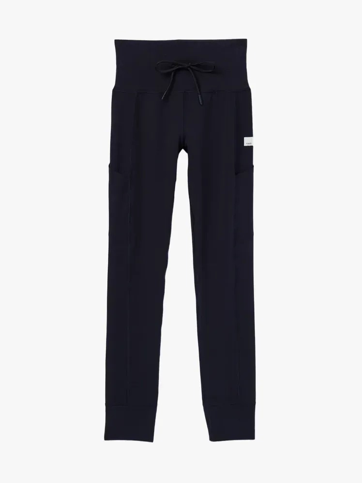 हल्के भूरे रंग की पृष्ठभूमि पर काले रंग में दैनिक पॉकेट लेगिंग