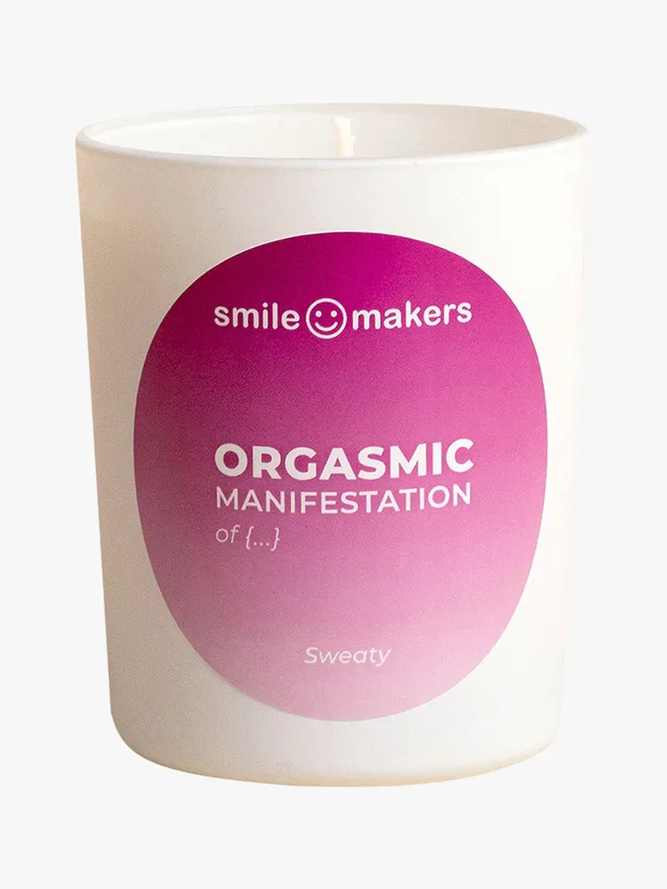 Свічка Smile Makers Sweaty Orgasmic Manifestations у фірмовому комплекті на світло-сірому фоні