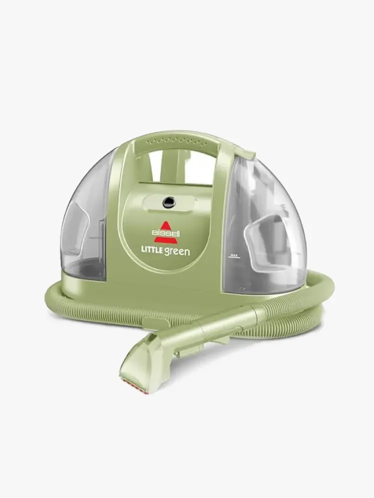Bissell Little Green Machine ในส่วนประกอบที่มีตราสินค้าบนพื้นหลังสีเทาอ่อน