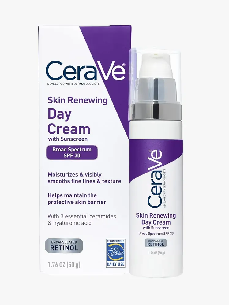 Cremă de zi reînnoitoare a pielii Cerave în componentă de marcă pe un fundal gri deschis