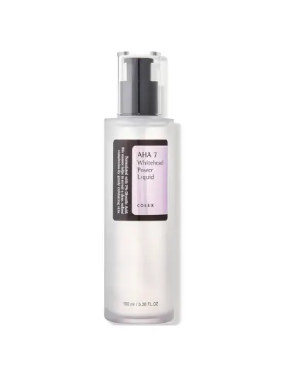 AHA 7 Whitehead Power Liquid en botella transparente de marca con bomba negra sobre fondo blanco