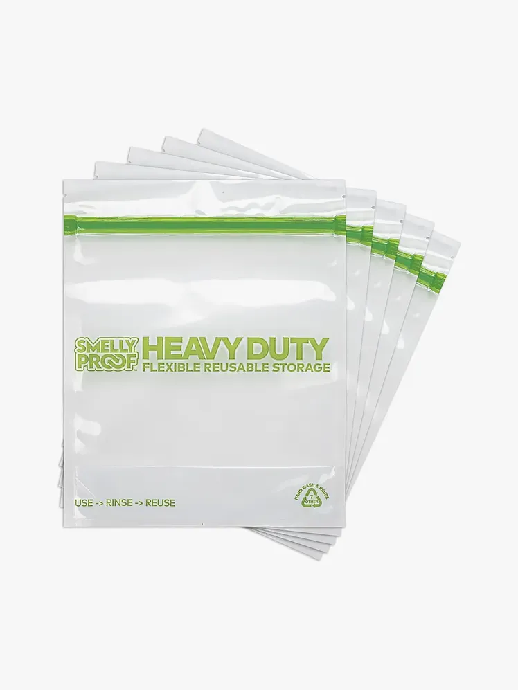 Nagy teherbírású, újrafelhasználható cipzáras táskák tiszta és zöld színben, világosszürke alapon